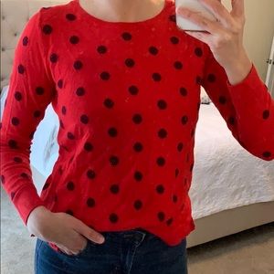 Red and maroon polka dot sweater